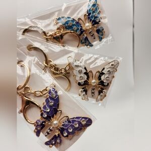 NEW 3 Piece Butterfly Keychain Set with Gold Hardware, Brand New!!💜🤍💙